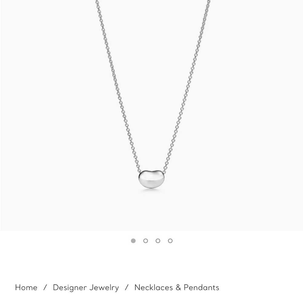 Tiffany and Co. sterling silver Elsa Peretti Bean necklace.